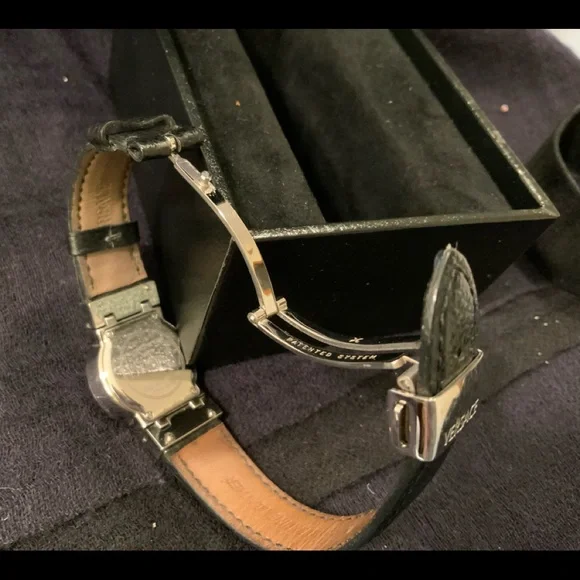 original VERSACE round silver face with black leather strap